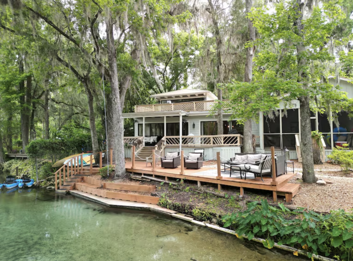 Complete view of Dream River House from waterside