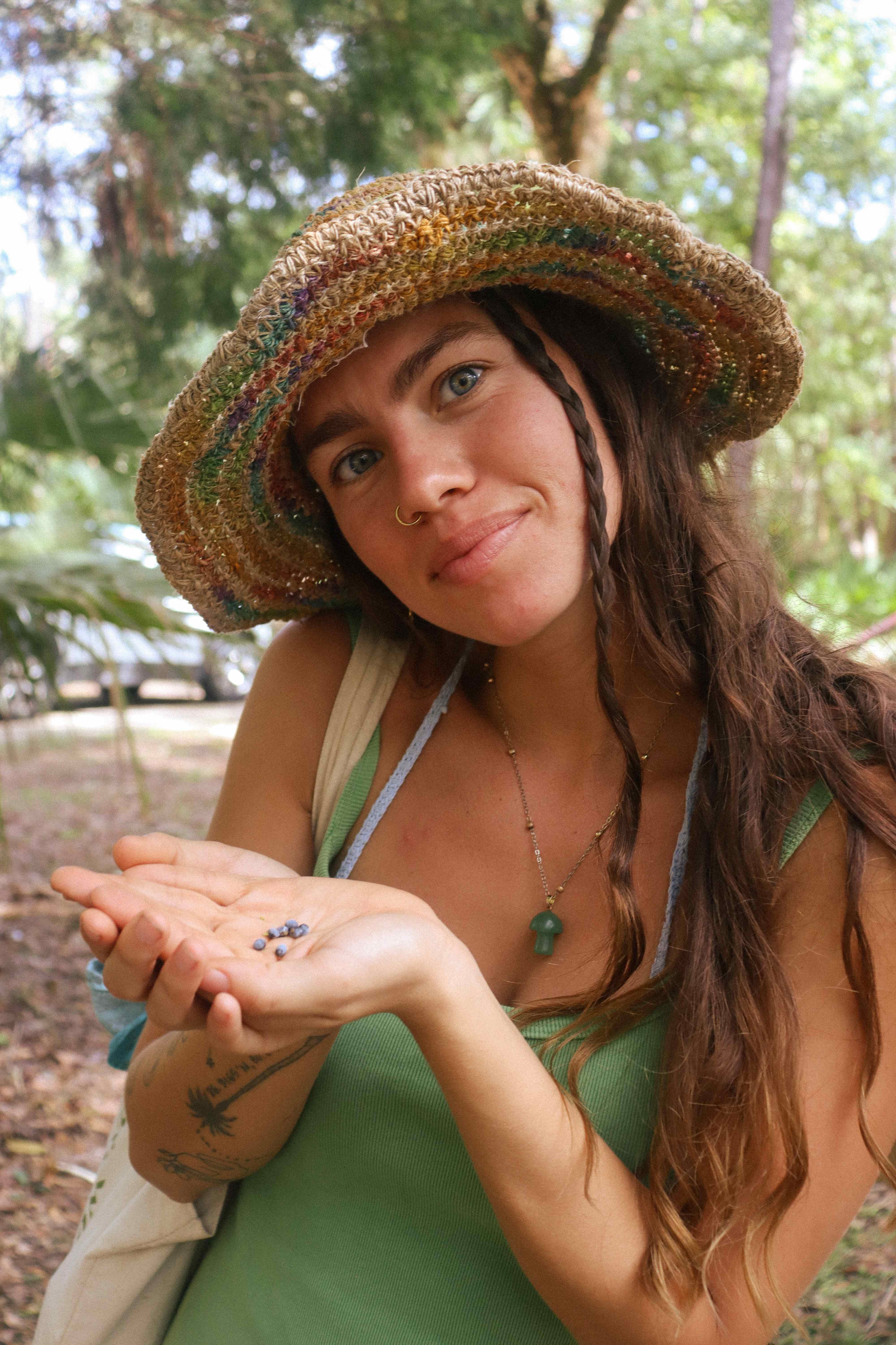 Joyful connection with nature holding seeds