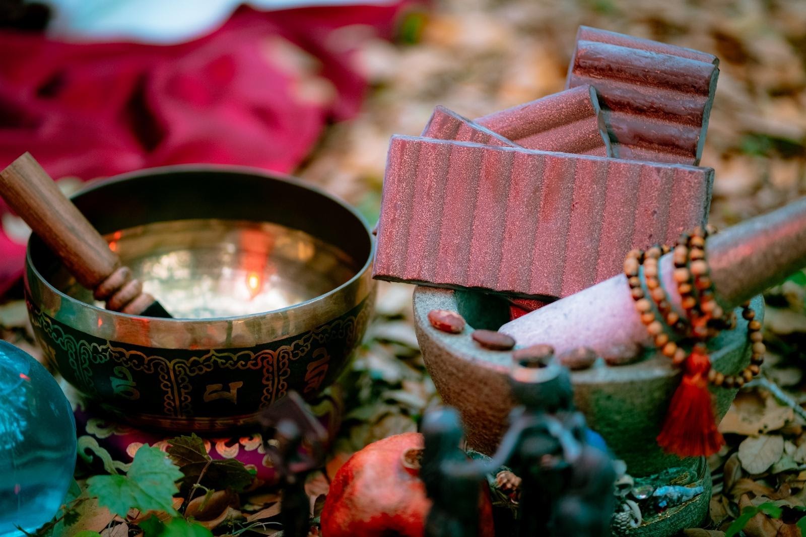 Ceremonial cacao blocks with singing bowl and sacred items