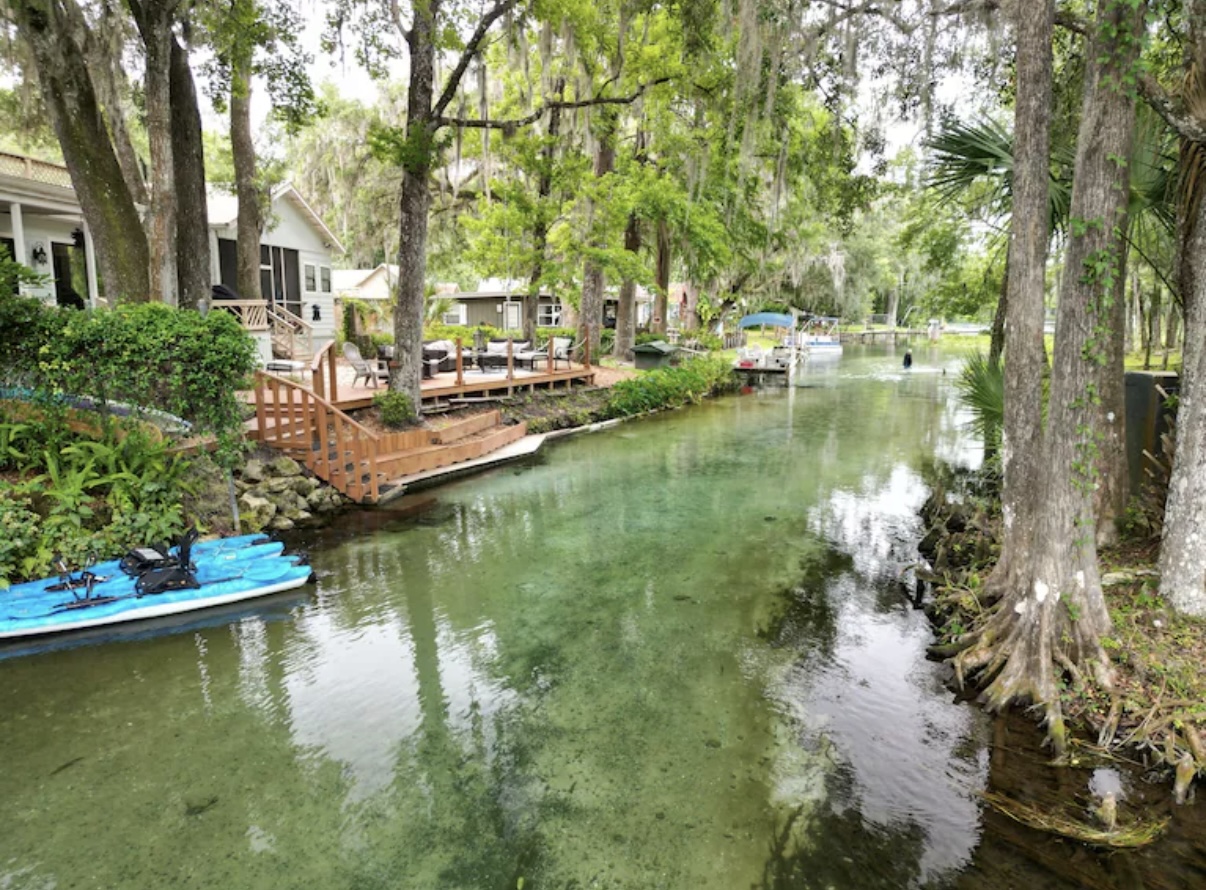 Spring water with kayaks and natural surroundings